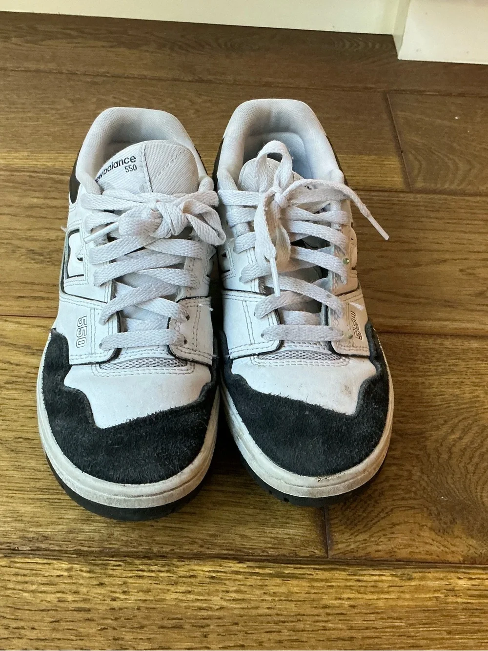 New Balance 550 White and Black Retro Sneakers